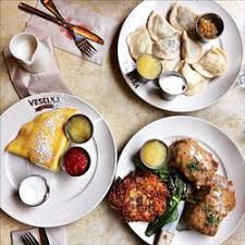 Blintzes, Stuffed Cabbage, and Pierogies on Veselka Plates