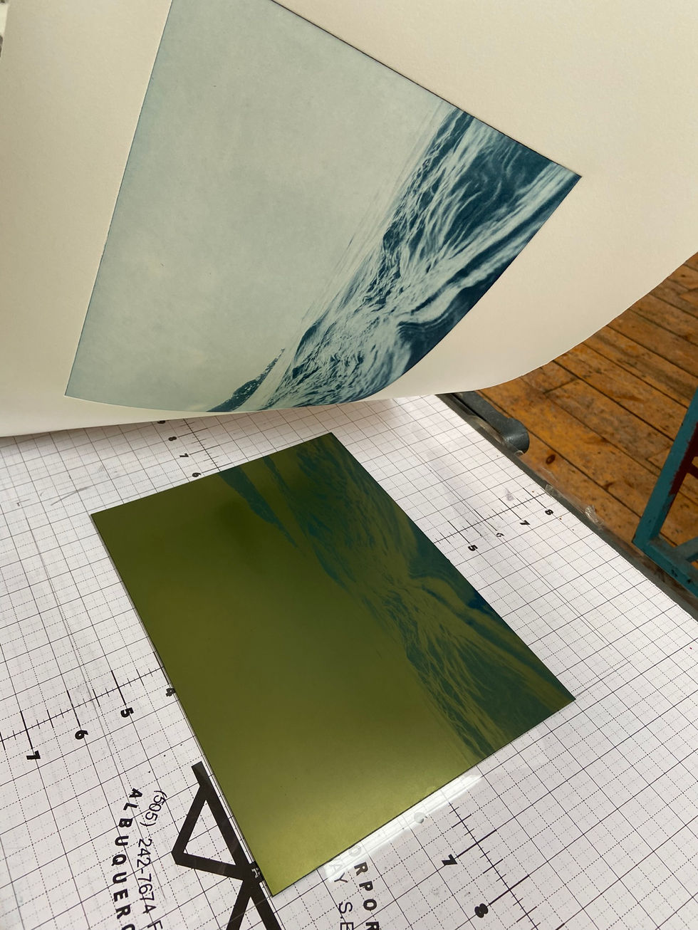 'Towards Dalkey' print reveal. Final step in the process of photo intaglio / photo etching where you can see the print once the plate has been pulled through the press.