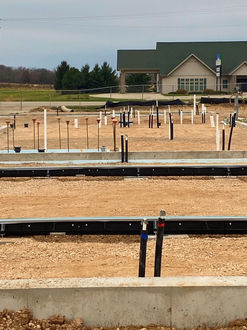 The interior plumbing and electrical are complete. Prep work for the slab on grade will begin on Monday.