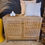 Miniature : Commode en teck et cannage LEA