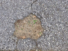 Potholes Remain a Blemish for the County 