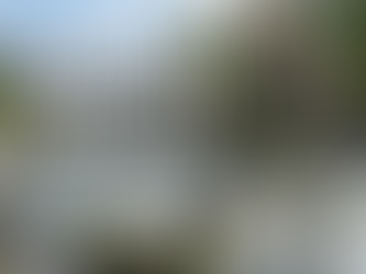 Fly fisherman wading in a rocky river with text overlay: SEEING WITH YOUR FEET, MASTERING THE ART OF WADING