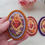 Thumbnail: Hand-embroidered medallion 'Sacred Heart of Jesus' crown of daisies and violets