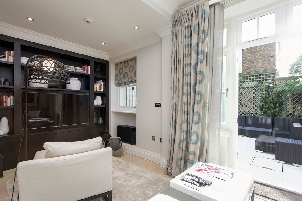 a living room with the bookshelf