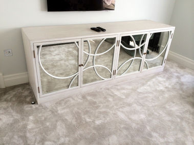 Bespoke storage cabinet with mirrored doors