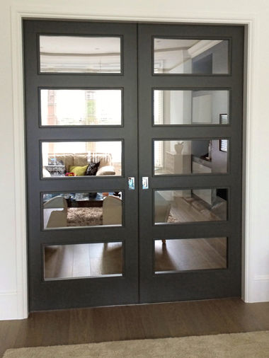 Bespoke timber doors with glazed panels, handcrafted internal doors made in London.