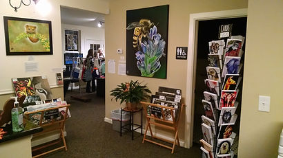 Karen's installed bee artwork and displayed prints and cards at Staufer Realty in Louisville for First Friday Artwalk