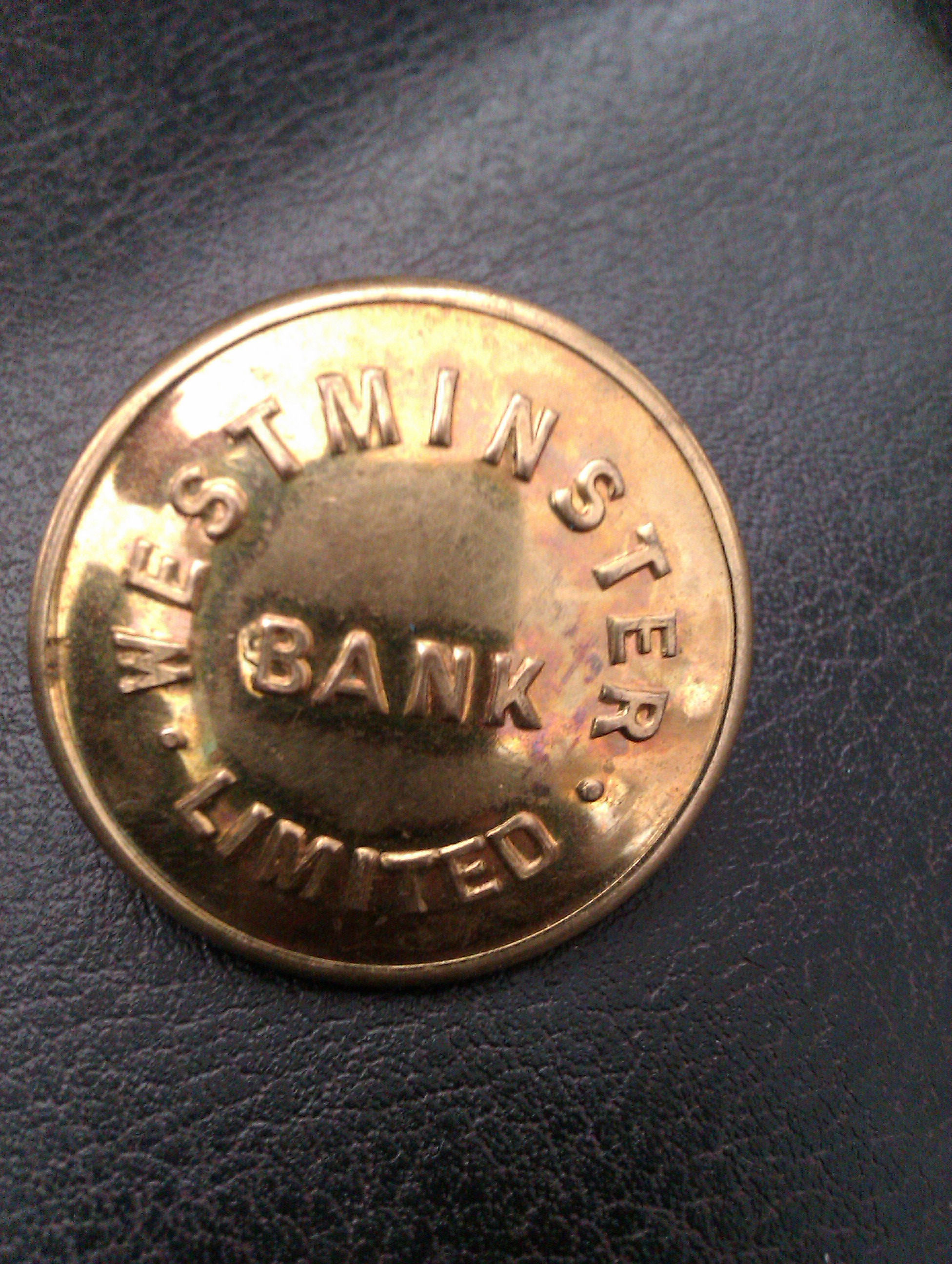 An Early Westminster Bank Brass Coat Button
