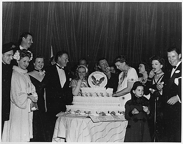 Eleanor Roosevelt, Gene Kelly, Charles Bickford, Veroinca Lake, Joe E. Brown, Jane Wyman, Myrna Loy, George Murphy, and Margaret O'Brien, 1945