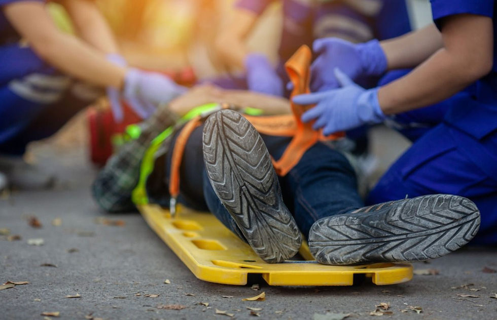 Medical team assiting a construction worker