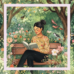 A woman reading on a park bench.