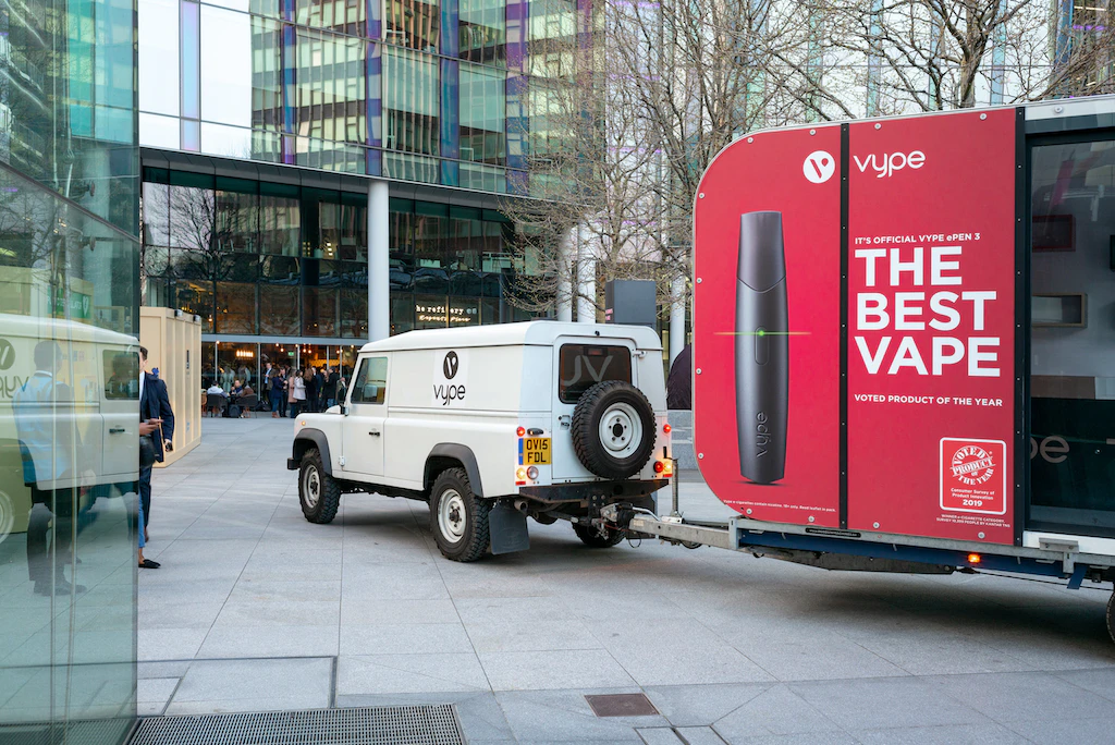 Towable branded temporary event structure pod for vaping company to provided branded experience to consumers.