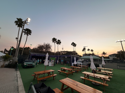 Image of a premium brand experience with seating available for fans.