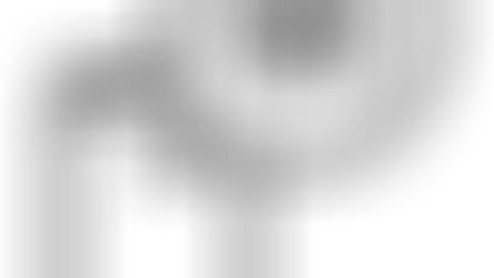Icon that is a black and white illustration of a mobile phone with a chat bubble and the 911 emergency number in the chat bubble. Depicts making an emergency call.