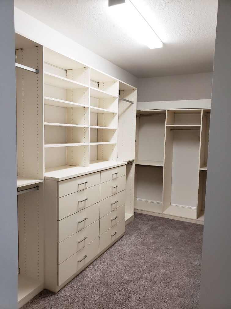 primary closet design with weird ceiling