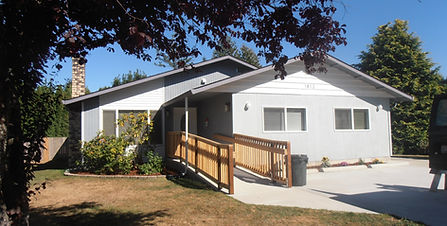 The front of a home with a ramp to the front door