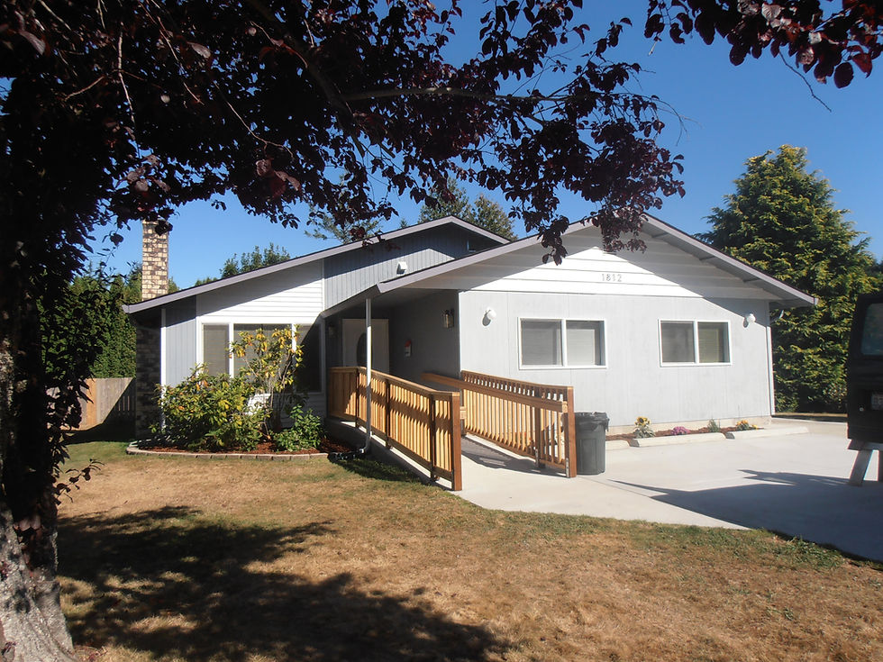 The front of a home with a ramp to the front door
