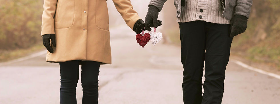 Couple Holding Hearts_edited_edited_edited.jpg