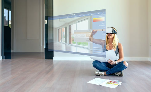 young-woman-using-decoration-application-with-virtual-reality-glasses.jpg