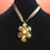 Thumbnail: Metal Flower Pendant w Topaz and Gold Colored Acrylic Gems on Brown Ribbon - 16"