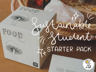 Food trivia box on a wooden table, beside a basket. Handwritten text says "Sustainable Student Starter Pack." The Loz Sandom Studios logo is in the bottom right-hand corner.