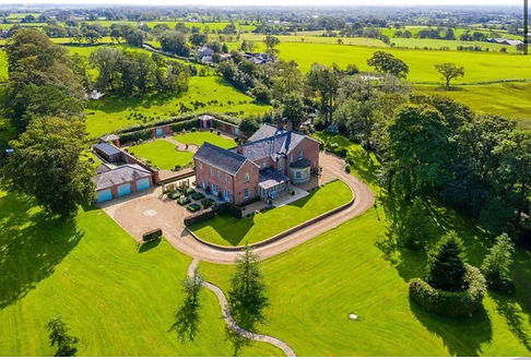 Large renovated and extended home with landscaped grounds and new garage – expert residential construction UK