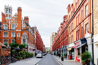 Central London street with residential apartments and mixed-use buildings — property development finance by LivFinance.
