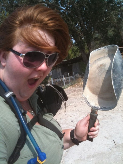 Glennis with the "ancient" frying pan she found while touring Beit She'an