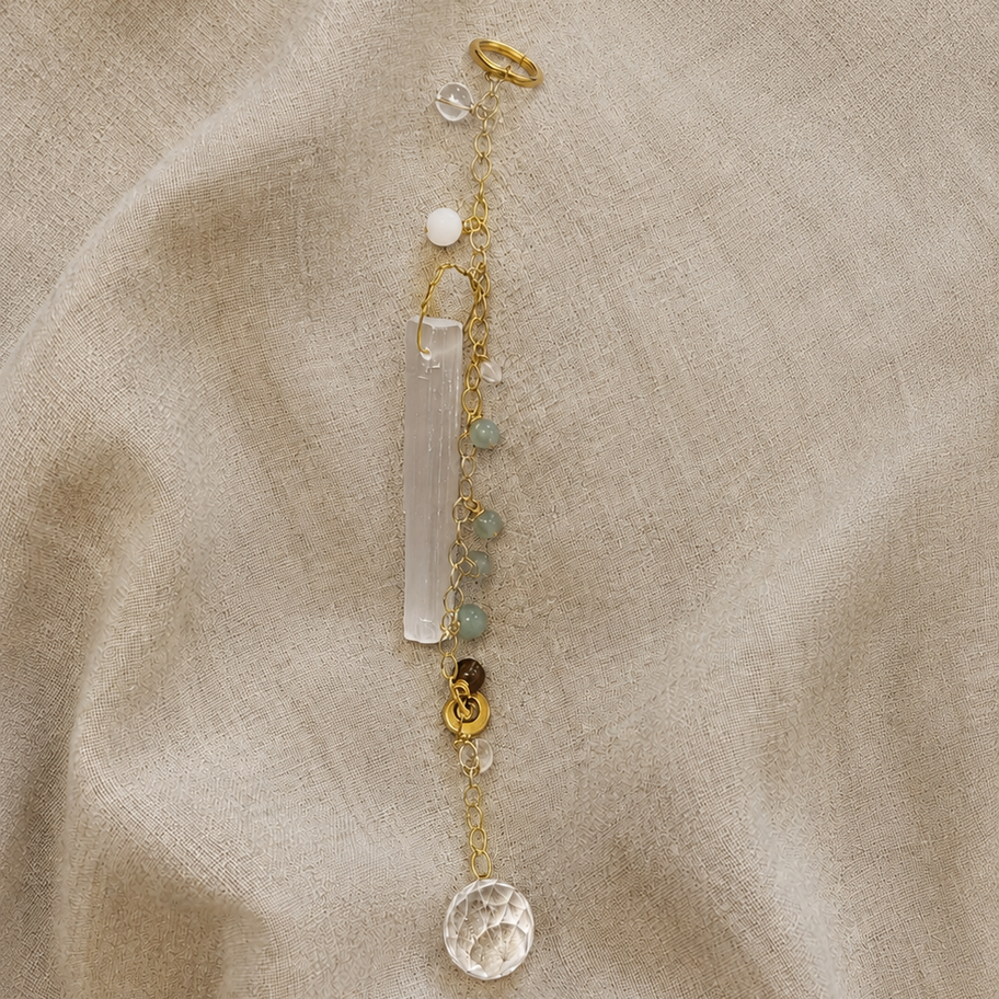 home blessing catcher laying on linen fabric