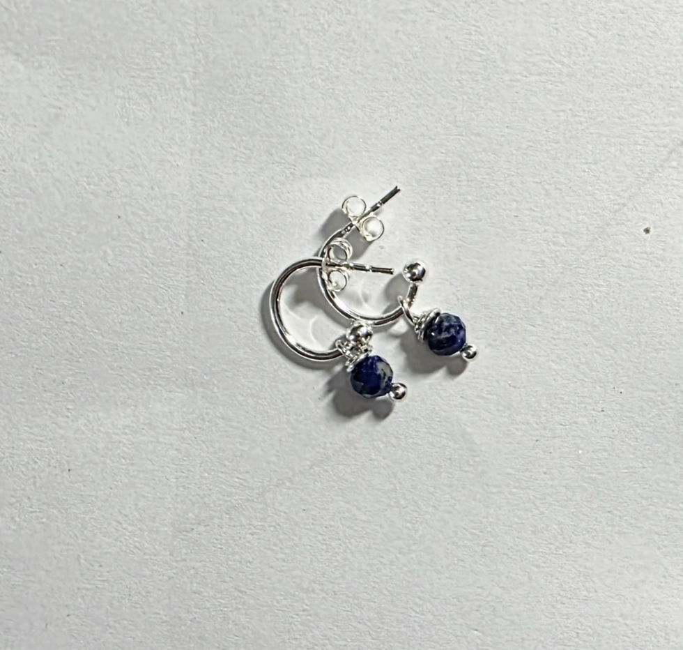 Celestial hoop drop earrings shown with amethyst gemstones