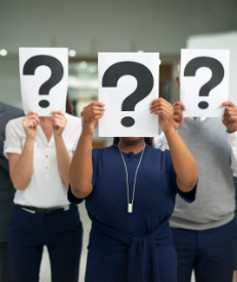 shot-of-a-group-of-businesspeople-holding-question-2023-11-27-05-12-41-utc.jpg