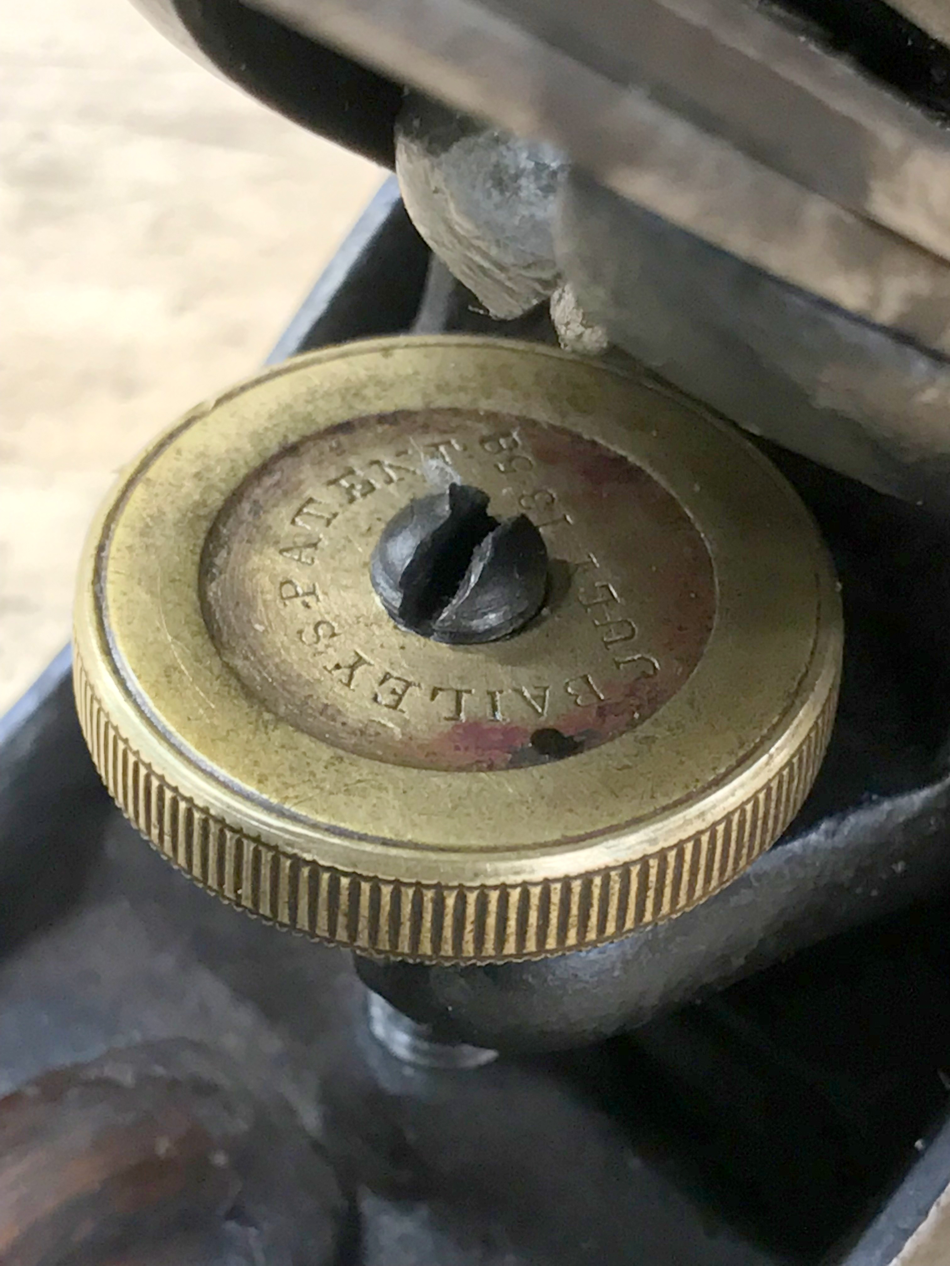 Vertical post adjusting knob.