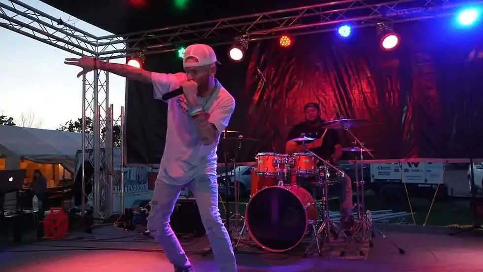 Man, Rapper, Mic, Cap, Jeans, Skinny, Ripped, Stage, Concert, Performing, Drummer, Drum, Mic, Stand, Tent, Music, Singer, Rapper