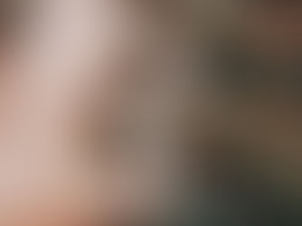 Hand holding a light bulb symbolizing signal clarity as the foundation of effective CX automation