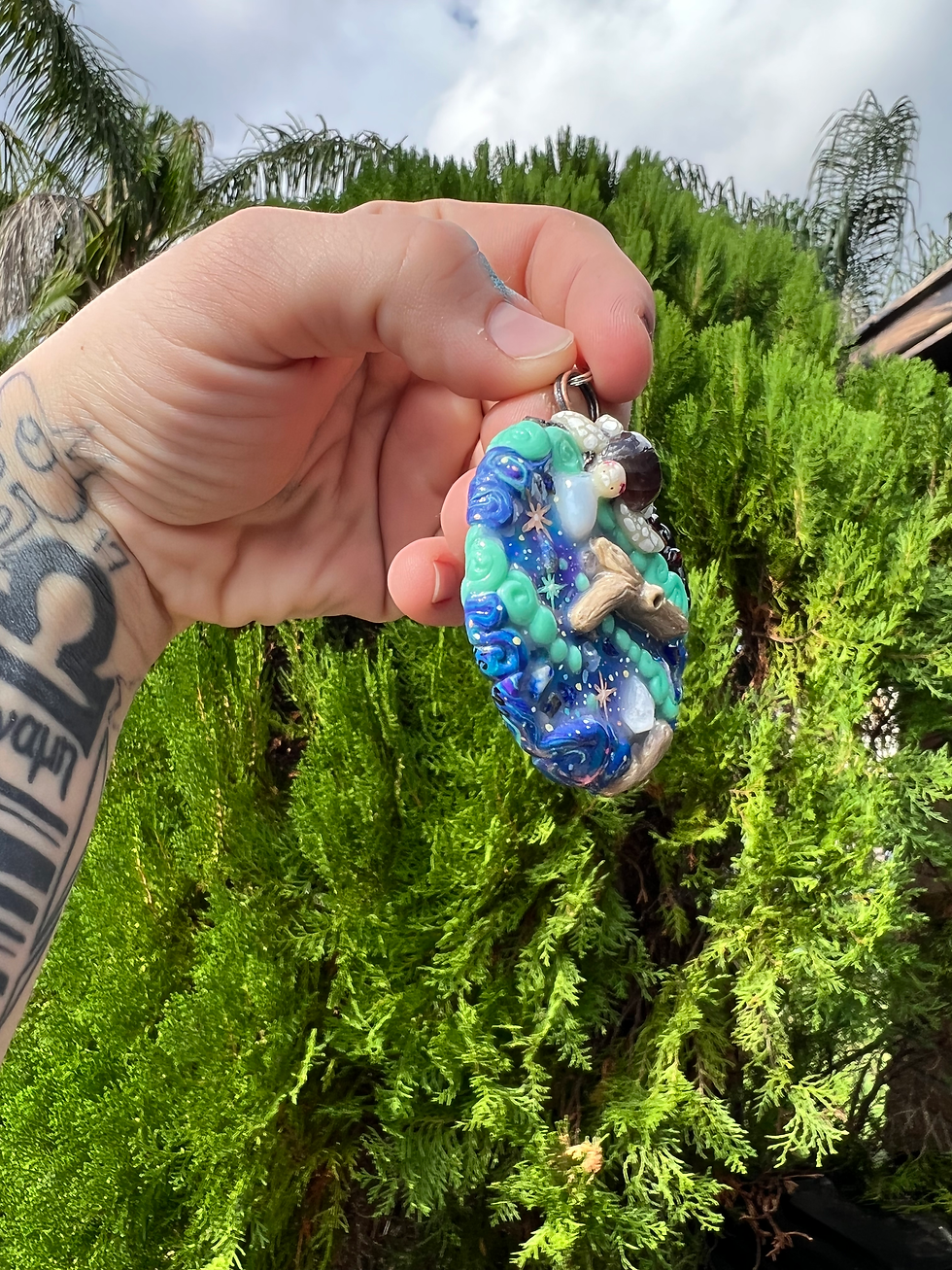 Thumbnail: Albino Turtle Galaxy Beach Painted Polymer Clay Sculpted Necklace