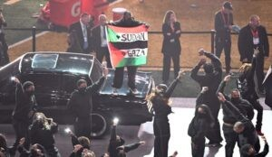 Super Bowl Halftime Performer Detained After Unplanned Flag Display