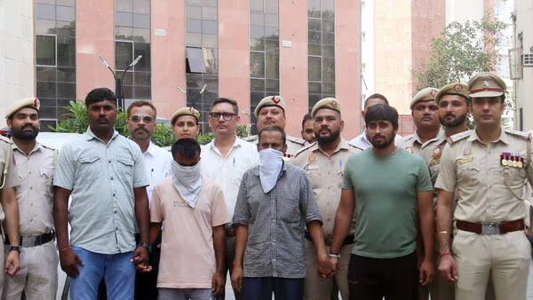 New Delhi, May 03 (ANI): Delhi police arrests 3 people in connection with an illegal Bangladeshi immigrants and fake documents racket, at PHQ in New Delhi on Saturday. (ANI Photo)(Gagan Pawar ) | Mint