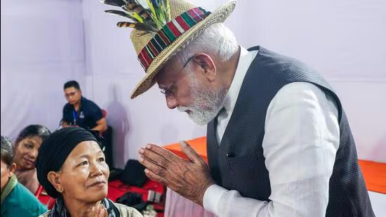 Prime Minister Narendra Modi interacts with violence-hit displaced people, in Manipur’s Churachandpur on Saturday. (DPR PMO) | Hindustan Times