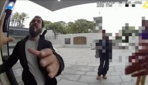 California: A Muslim individual visits a police station and stabs an officer in the neck; investigators are reviewing their mental health history