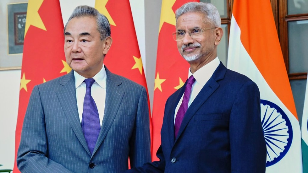 Jaishankar shakes hand with his Chinese counterpart Wang Yi, left in New Delhi on Monday. (Image: AP) | Financial Express
