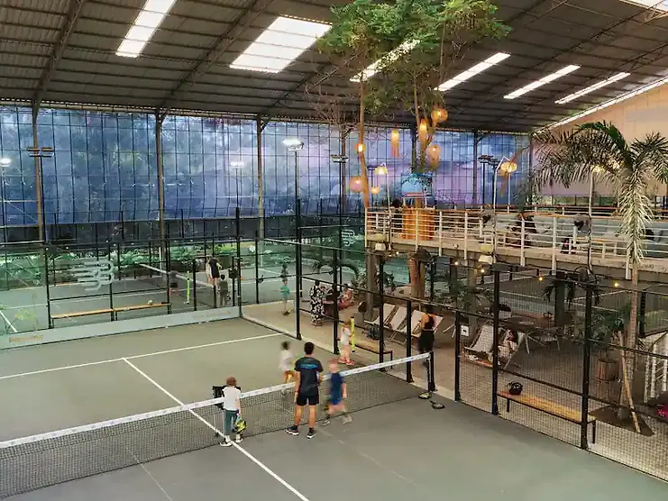 Birdseye view of the bandeja court with a bam bam padel coach and kids