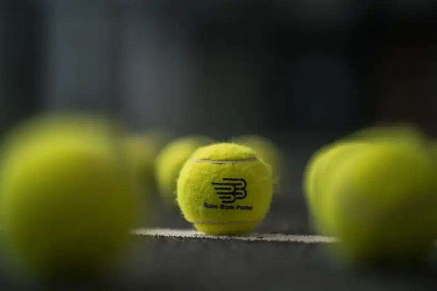 Padel balls array with 1 padel ball in focus