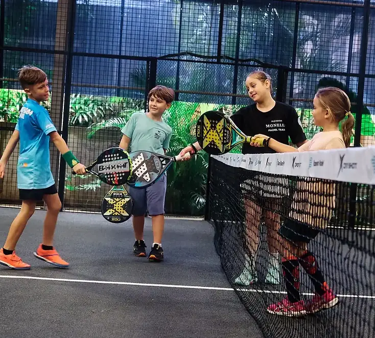 Kids giving high fives after a match