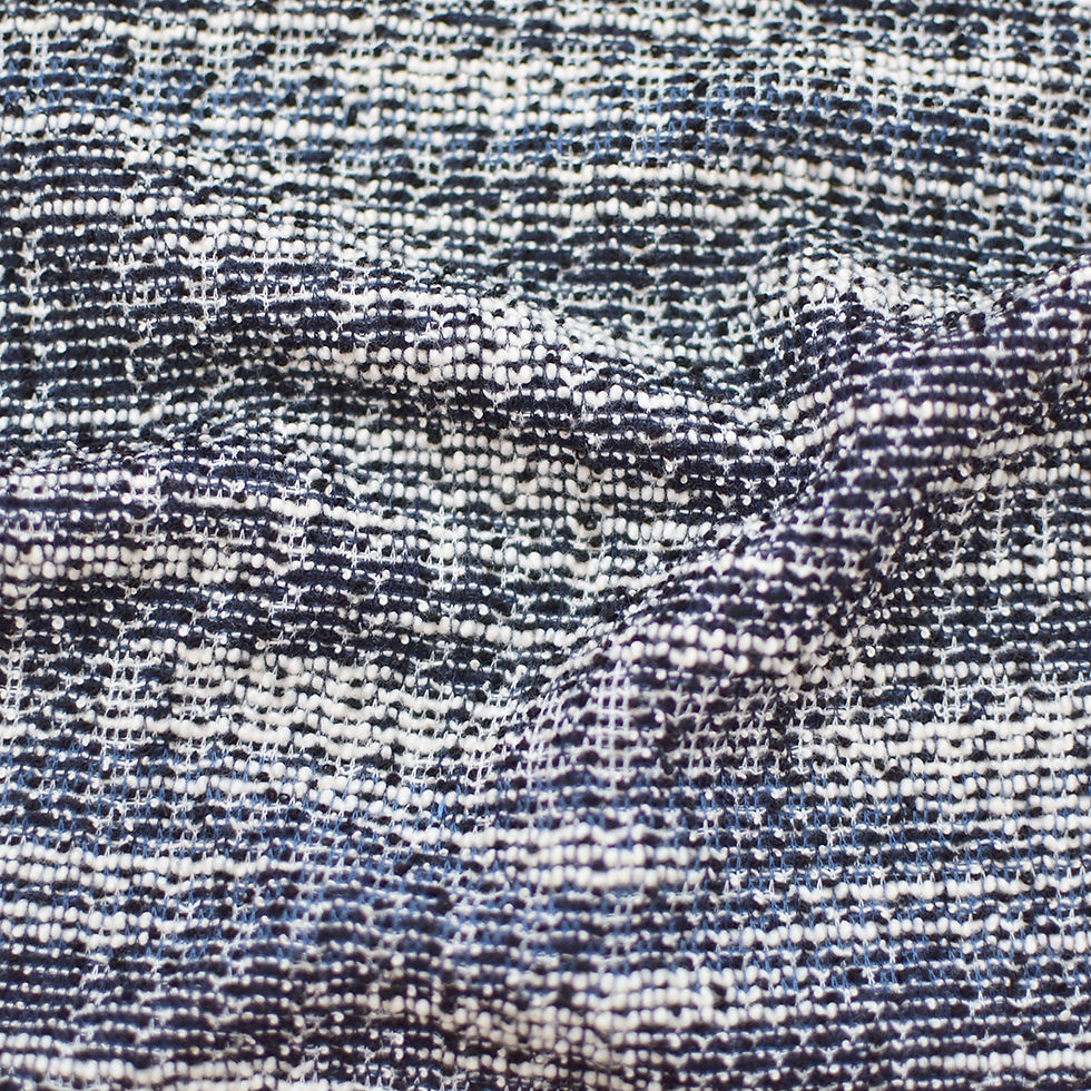 The front side of the blue knit boucle