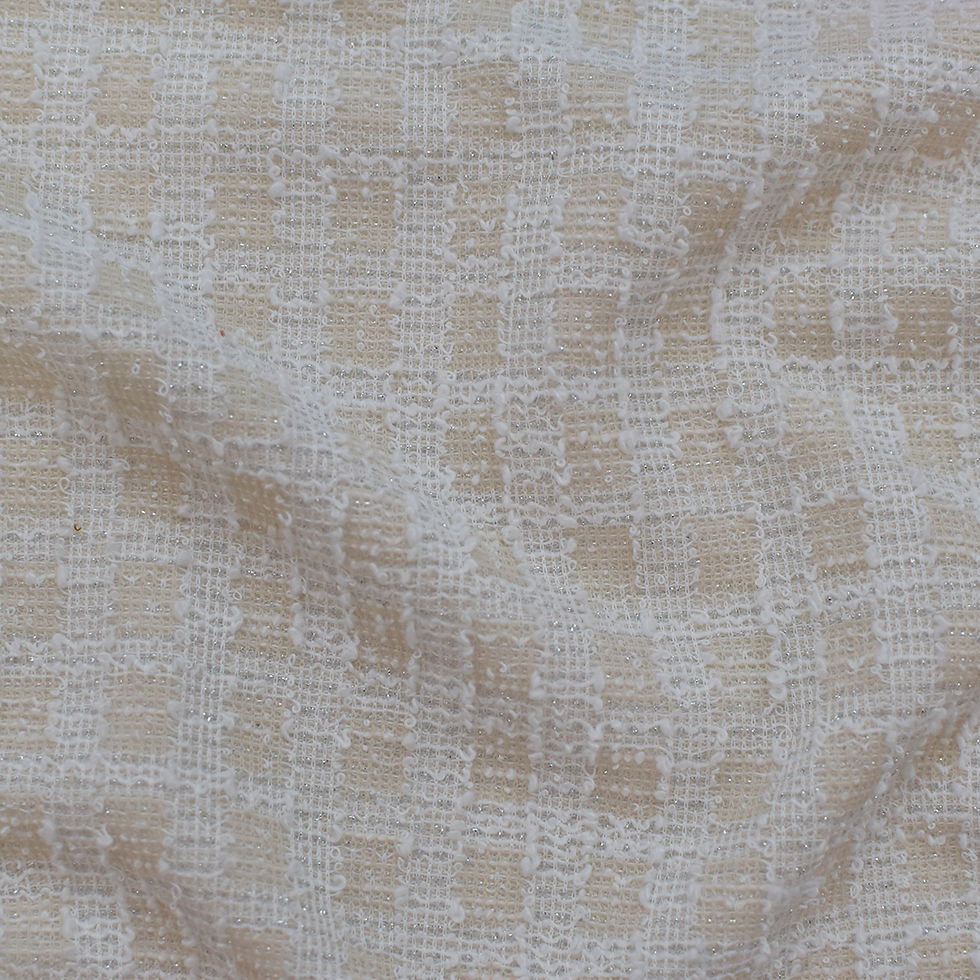 The front side of the white knit boucle