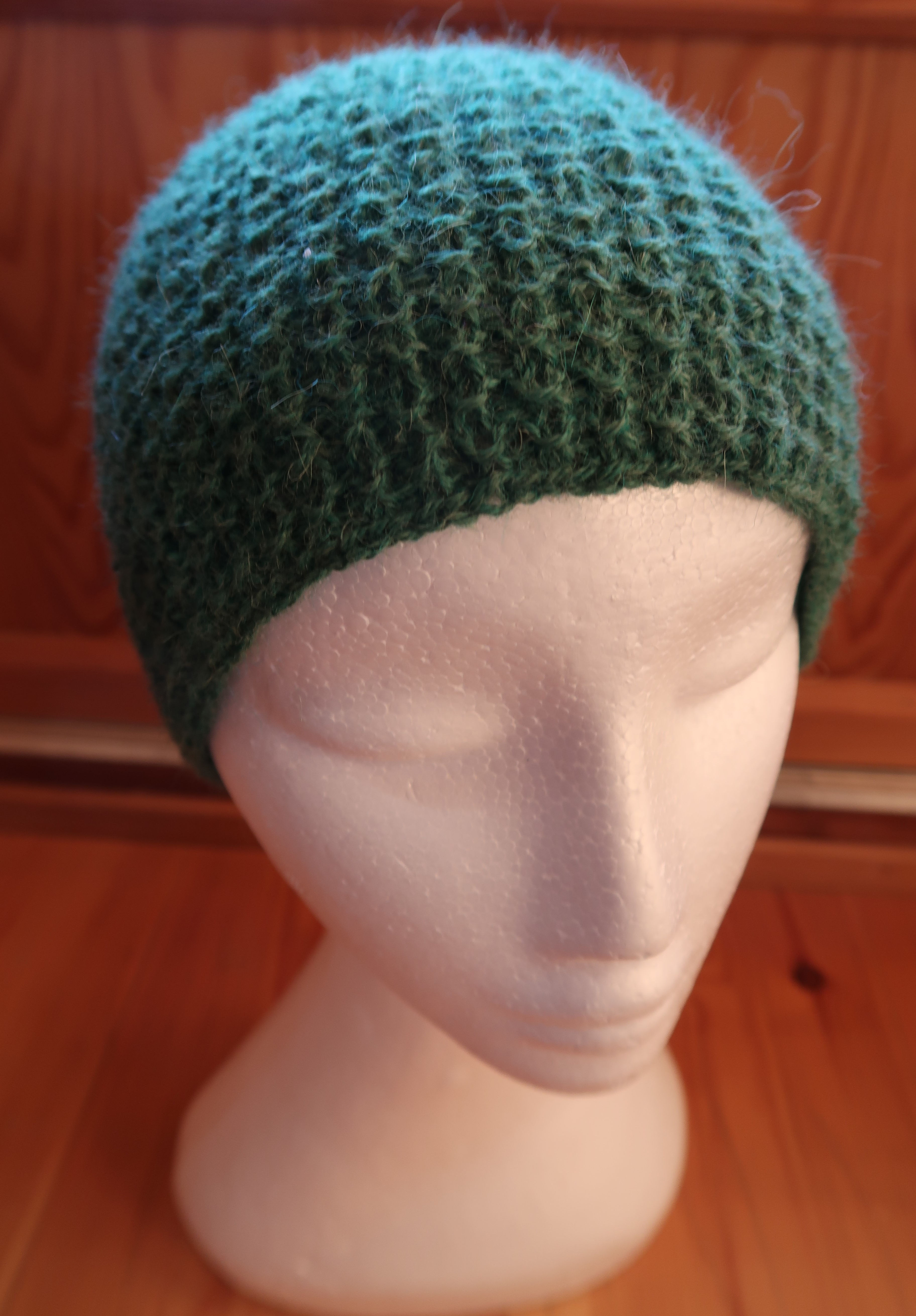 PB24d: Pannebånd i Alpakka. Grønn.