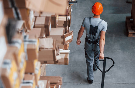 1920-young-male-worker-in-uniform-is-in-the-warehouse-with-pallet-truck.jpg