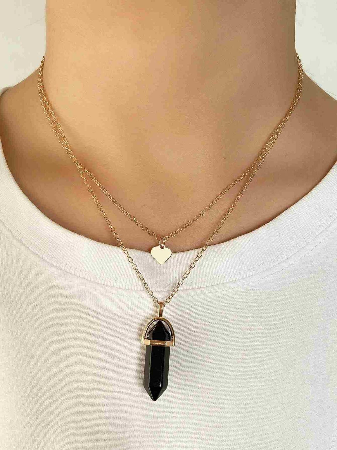 Collar doble de péndulo negro