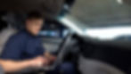 Police officer running a license plate