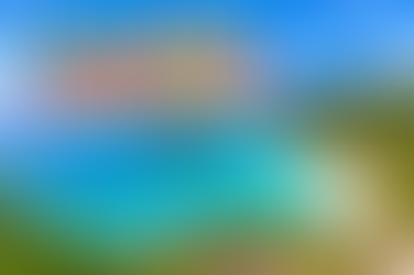 Colorful Trunk Bay St. John travel graphic showing a sweeping turquoise bay, white-sand beach, lush green hills, and bold destination text.